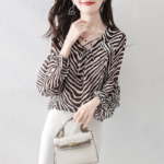 2022 Spring and Autumn New Women's Zebra Print Shirt Temperament Lantern Sleeve V-neck Lace Top Blouse Female All-match 1